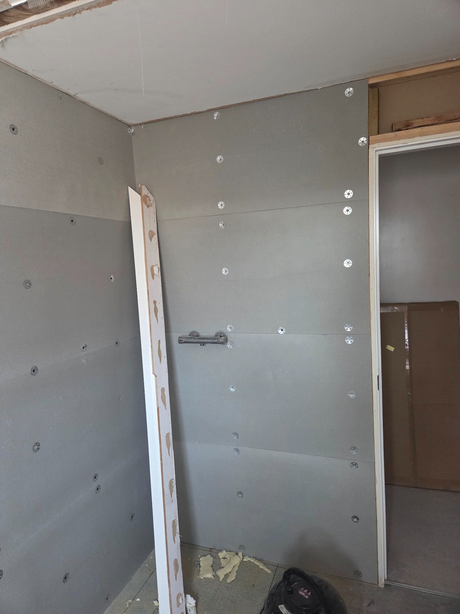Bathroom wall preparation and boarding